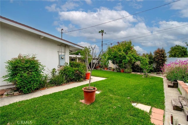 view of yard featuring fence