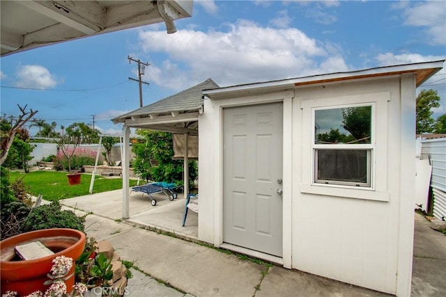 view of shed featuring a fenced backyard