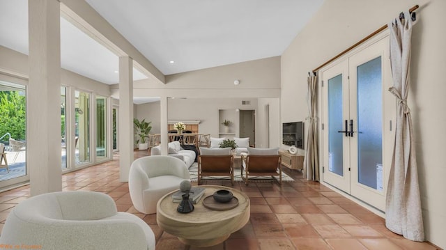 sunroom with french doors and lofted ceiling