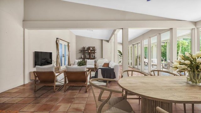 sunroom / solarium with vaulted ceiling