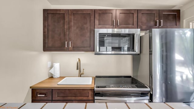 kitchen featuring sink and appliances with stainless steel finishes