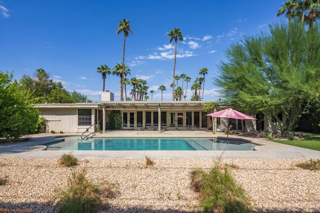 view of pool featuring a patio area