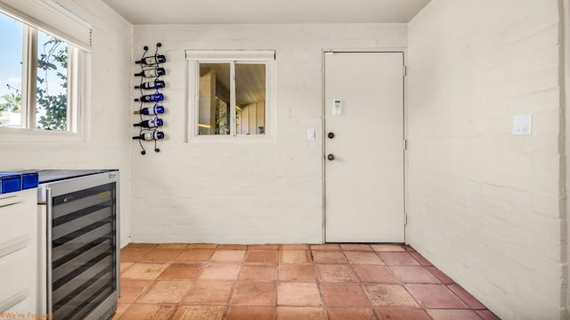 interior space with bar and beverage cooler