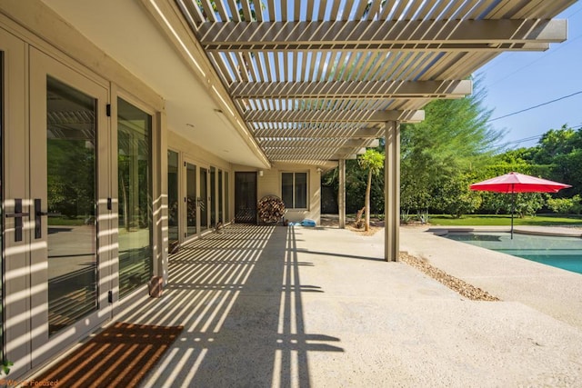 view of patio featuring a pergola