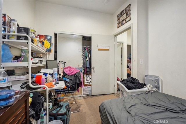 carpeted bedroom featuring a closet