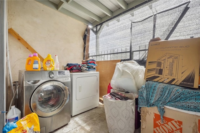 laundry room with washer and dryer