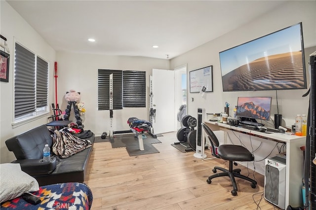 office space with light hardwood / wood-style flooring