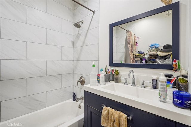 bathroom featuring vanity and shower / bathtub combination with curtain