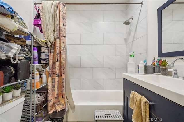 full bathroom featuring vanity, toilet, and shower / bath combo