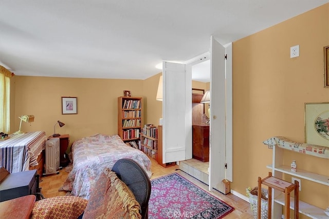 bedroom featuring radiator