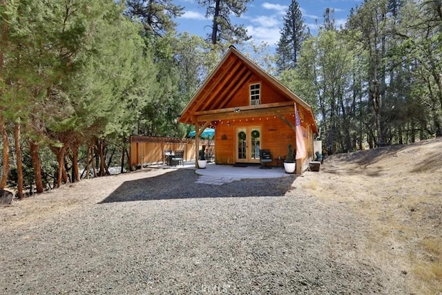 12828 Broyles Trl, Oregon House, CA 95962 - rear view of property featuring french doors and a patio area