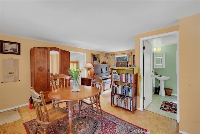 dining area with light parquet flooring