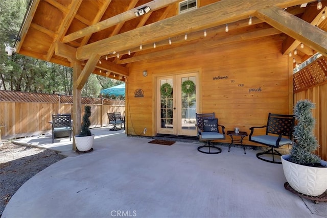 view of patio featuring french doors