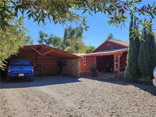 exterior space with a carport