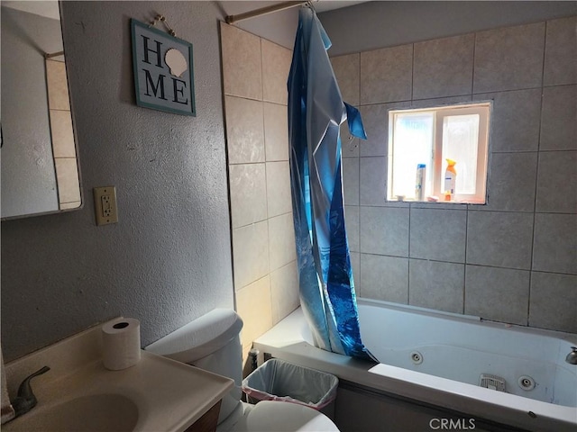 full bathroom featuring vanity, toilet, and shower / bath combo with shower curtain