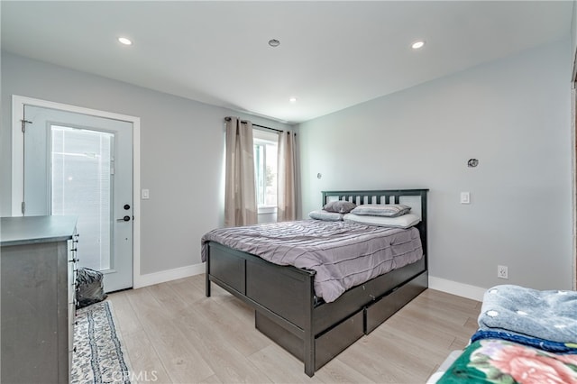 bedroom with light hardwood / wood-style floors