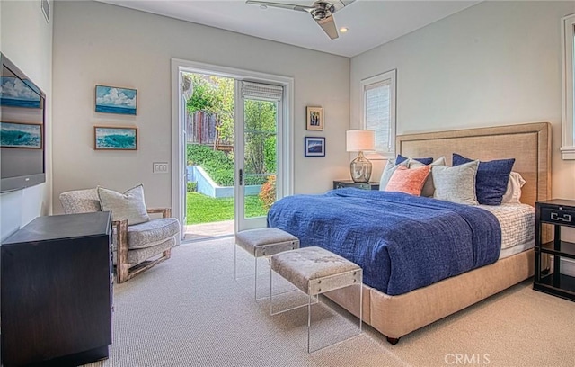 bedroom featuring ceiling fan, carpet floors, and access to outside