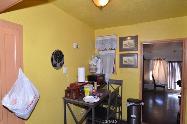 14407 S Corlett Ave, Compton, CA 90220 - dining area featuring a textured wall and a textured ceiling