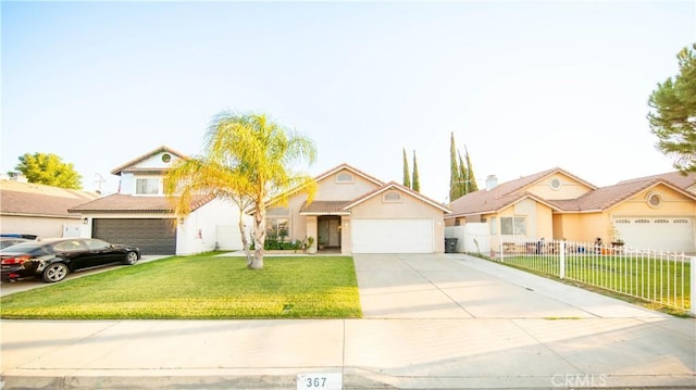 ranch-style house featuring fence, concrete driveway, a tiled roof, stucco siding, and a front lawn