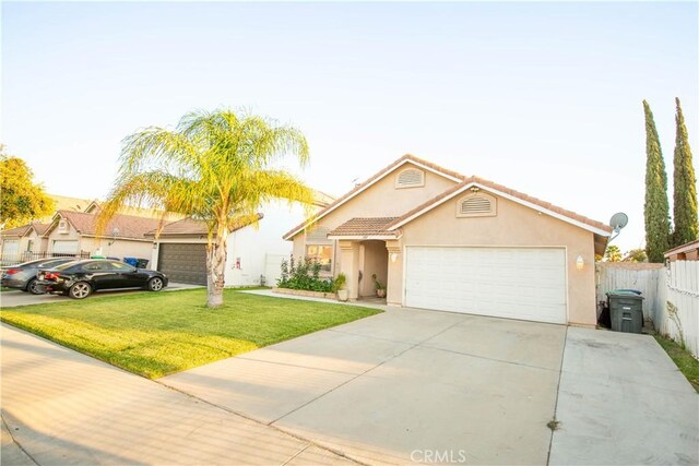 ranch-style house with a garage and a front yard