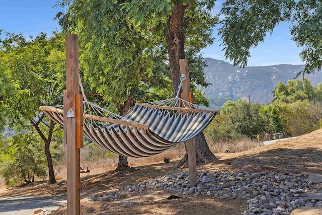 surrounding community featuring a mountain view