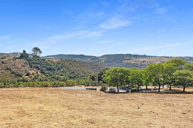 view of mountain feature featuring a rural view