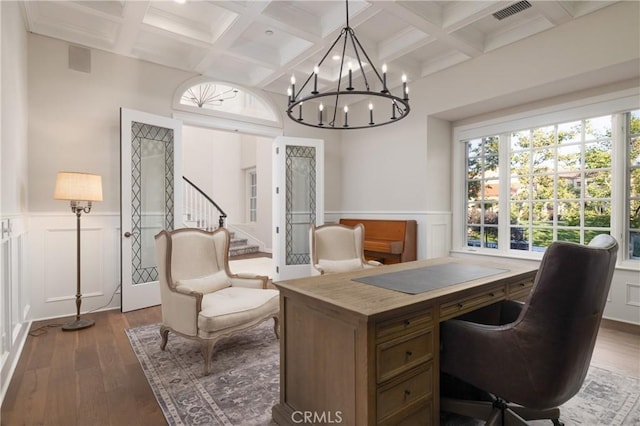 office space featuring beam ceiling, wood-type flooring, and coffered ceiling