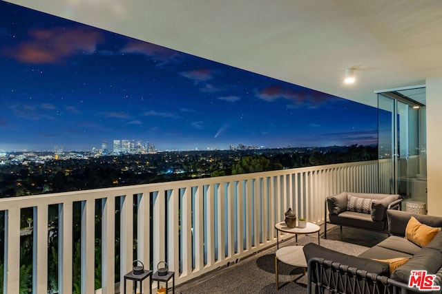 view of balcony at dusk