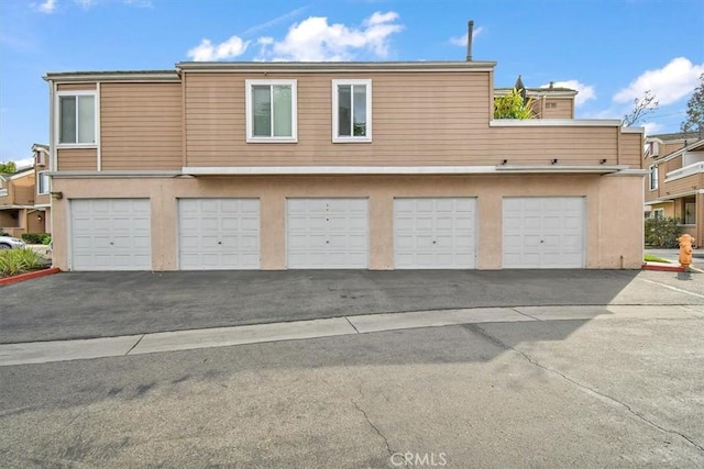 exterior space with a garage