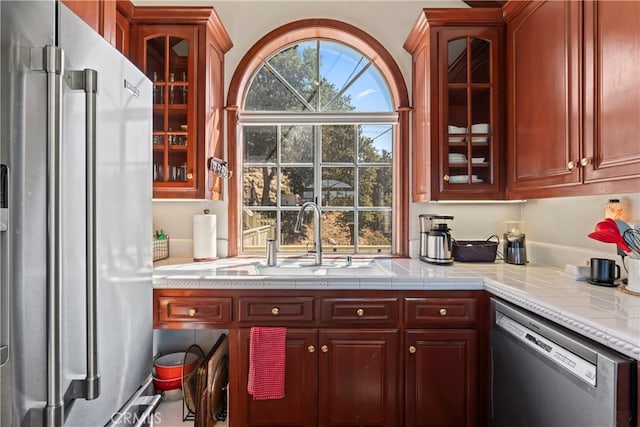 kitchen with appliances with stainless steel finishes and sink