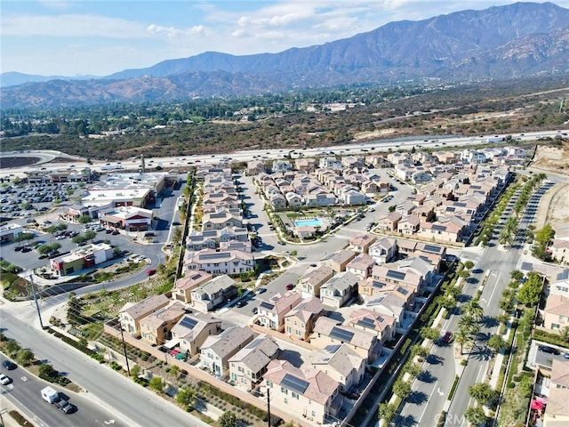 drone / aerial view featuring a mountain view