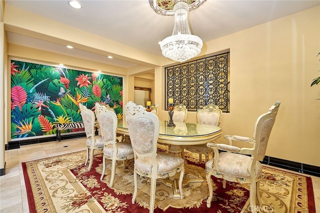 dining room with a notable chandelier and tile patterned floors