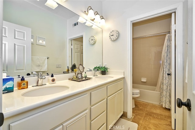 full bathroom with shower / bathtub combination with curtain, toilet, and vanity