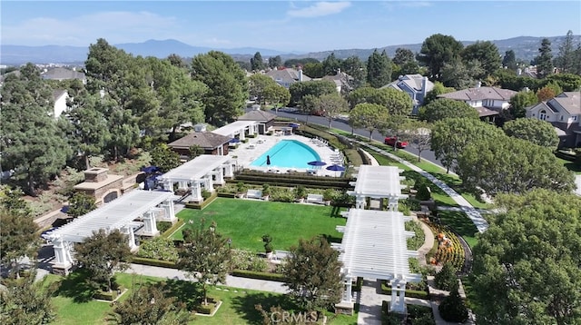 drone / aerial view with a mountain view and a residential view