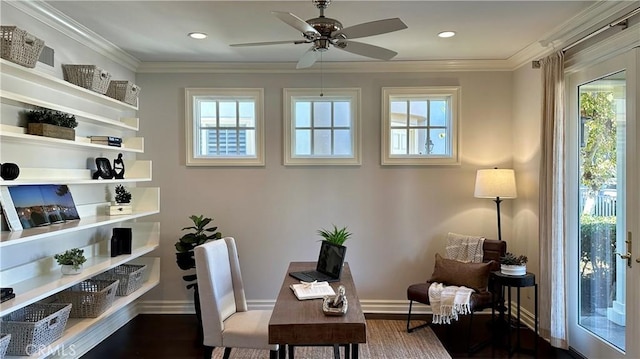 office area featuring a wealth of natural light, dark wood-type flooring, and ornamental molding