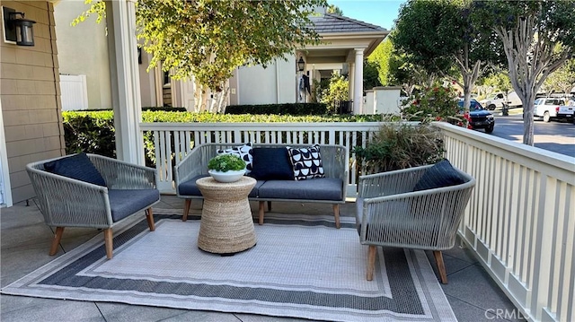 deck featuring outdoor lounge area