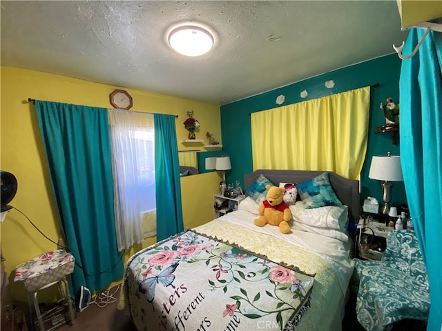 bedroom with a textured ceiling