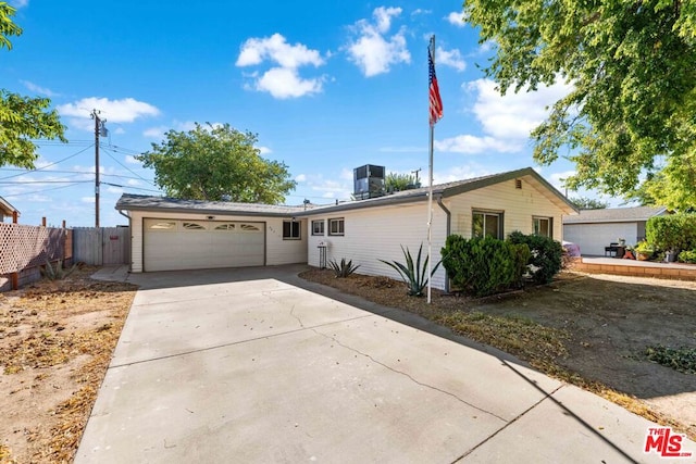 ranch-style home with a garage