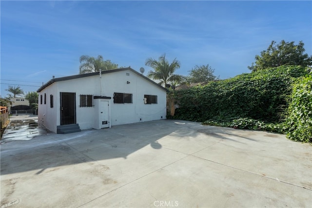 view of home's exterior featuring a patio area