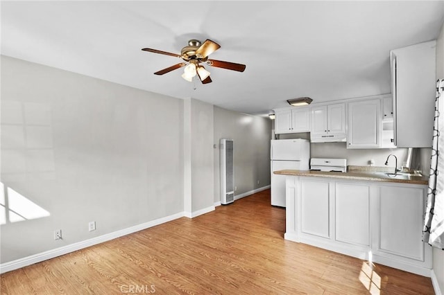 kitchen featuring ceiling fan, white refrigerator, stove, light hardwood / wood-style floors, and white cabinets