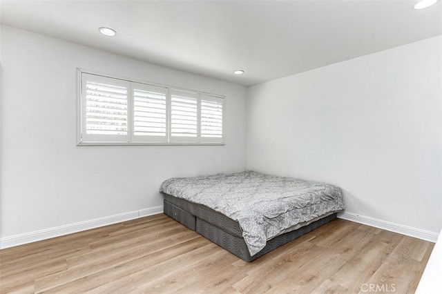 bedroom featuring light wood-type flooring