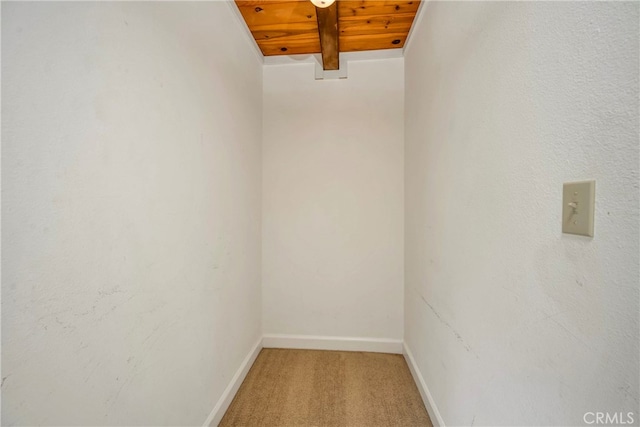 interior space featuring wood ceiling