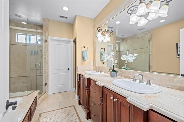 bathroom featuring vanity, independent shower and bath, and tile patterned flooring