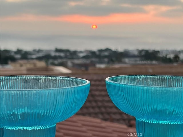 view of pool at dusk