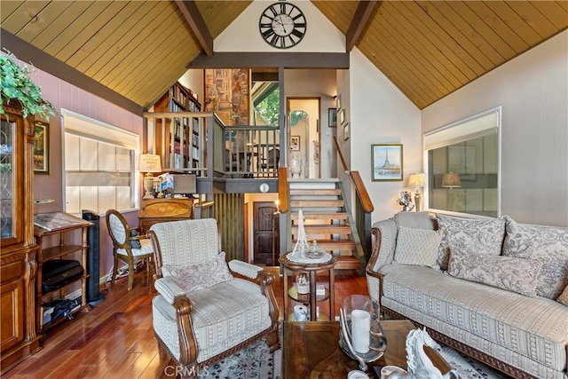 living room featuring hardwood / wood-style floors, high vaulted ceiling, wooden ceiling, and beamed ceiling