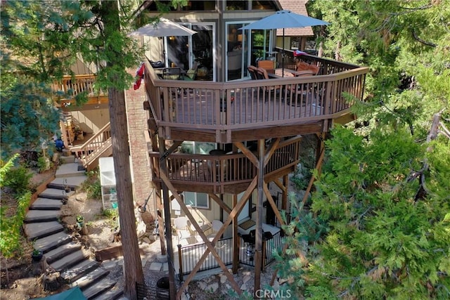 view of jungle gym featuring a deck