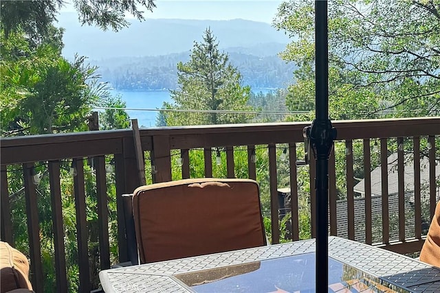 balcony featuring a deck with mountain view