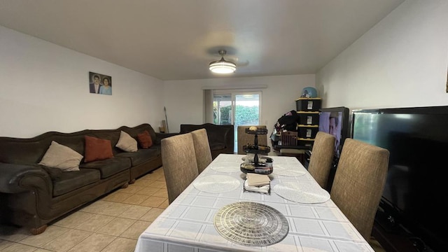 dining area featuring light tile patterned floors