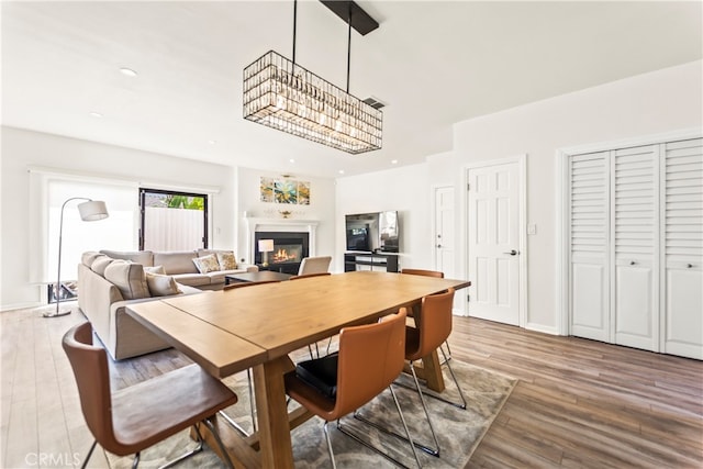 dining room with wood-type flooring