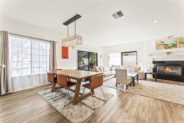 dining room with light hardwood / wood-style floors